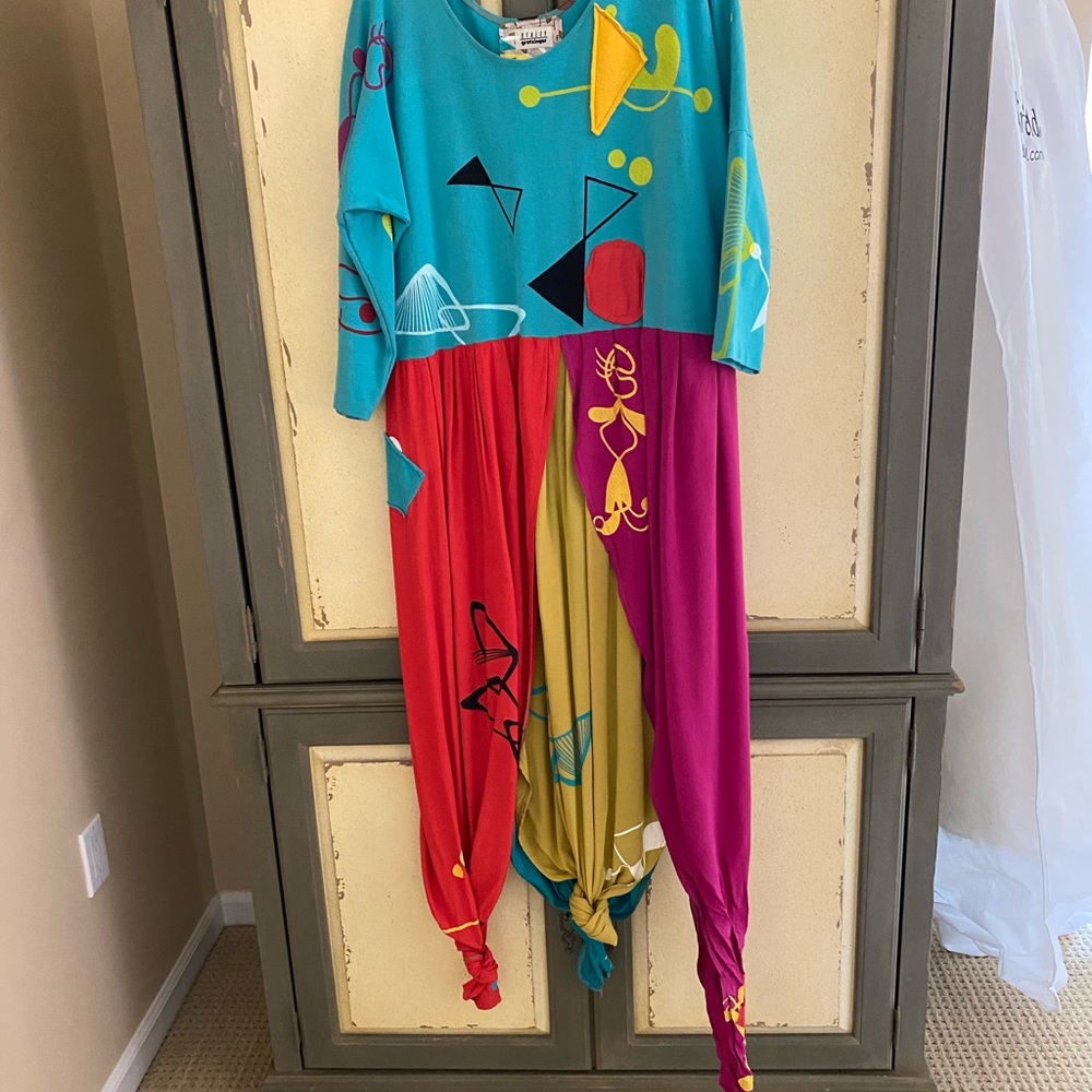 Vintage Staley Gretzinger “wearable art” dress has a very unusual hemline.